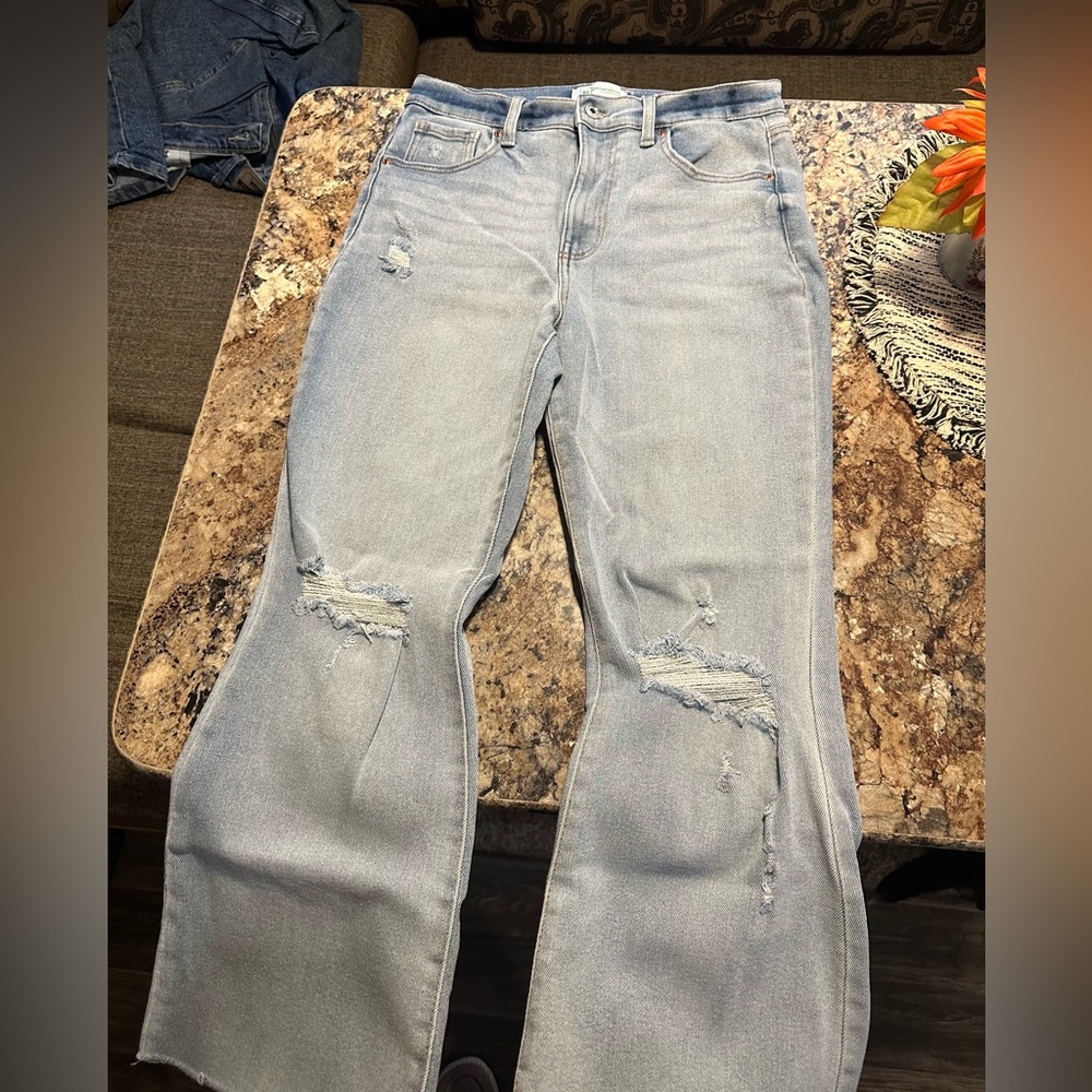 Distressed boot cut/flare jeans